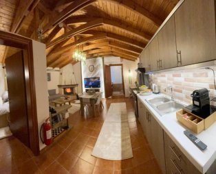 Stone Calm: A stone house for moments of relaxation in Ammoudara Kastoria