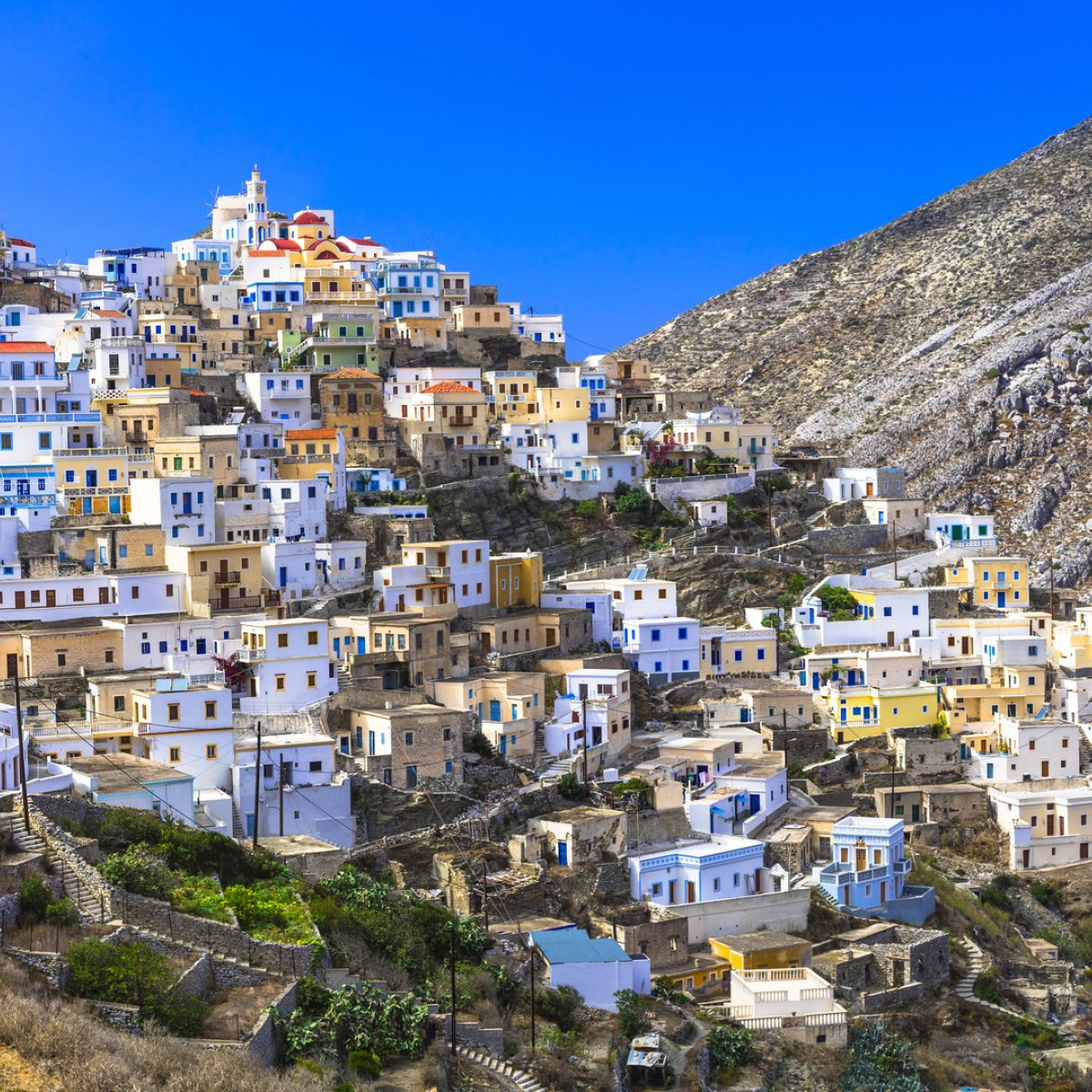 https://www.travelgo.gr/sites/default/files/styles/travel_share_1x1/public/2025-09/olympos_karpathos_shutterstock%20%281%29.jpg?itok=M-poNVr-